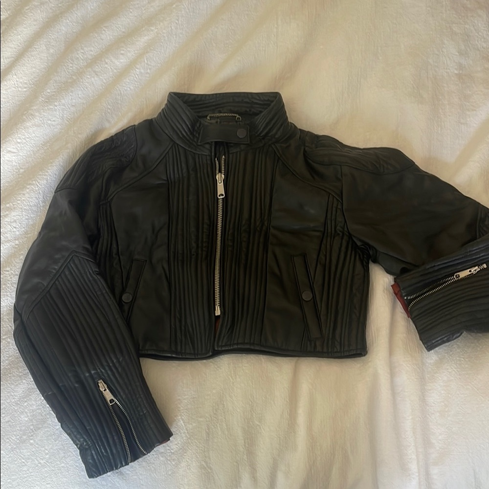 NWOT Free People black cropped leather jacket.